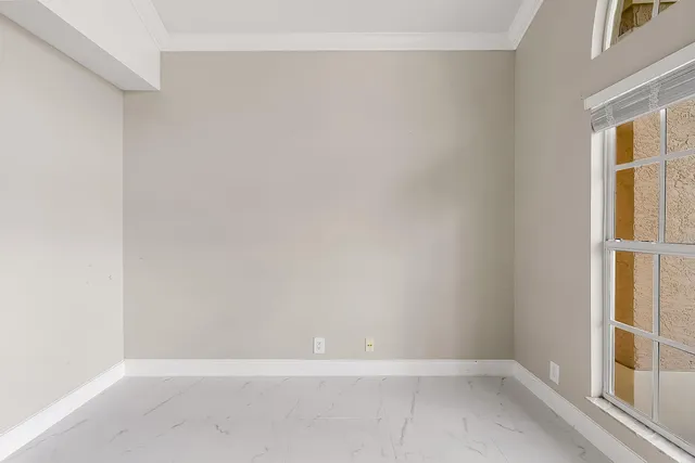 a kitchen with stainless steel appliances granite countertop a refrigerator and a stove