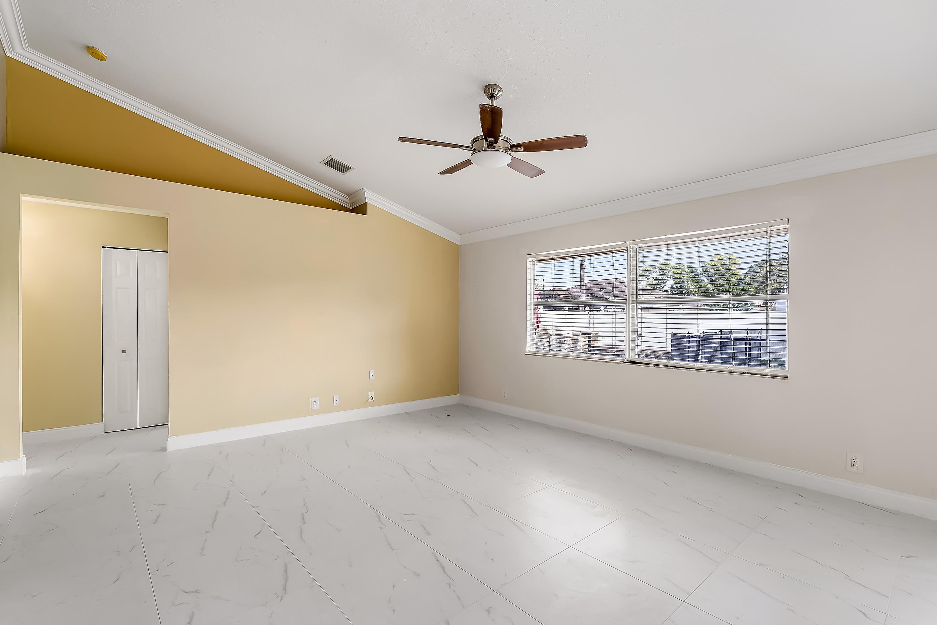 2962 Southwest Coastal Terrace Port St. Lucie, FL 34953 - Photo 24 of 59 a view of an empty room with a window
