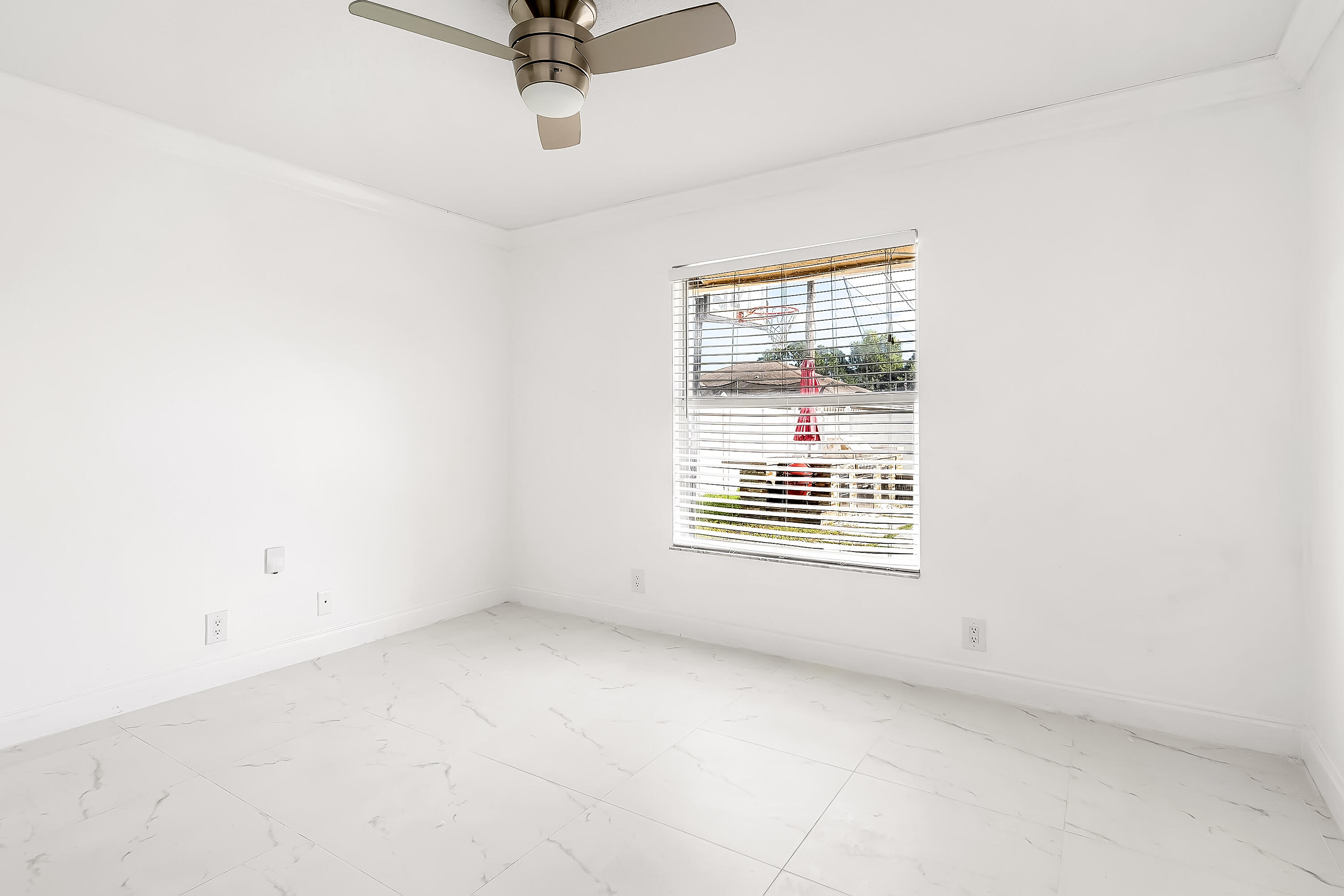 2962 Southwest Coastal Terrace Port St. Lucie, FL 34953 - Photo 36 of 59 a view of an empty room with a window