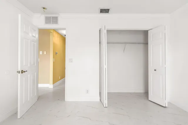 a view of entryway and hall with a window