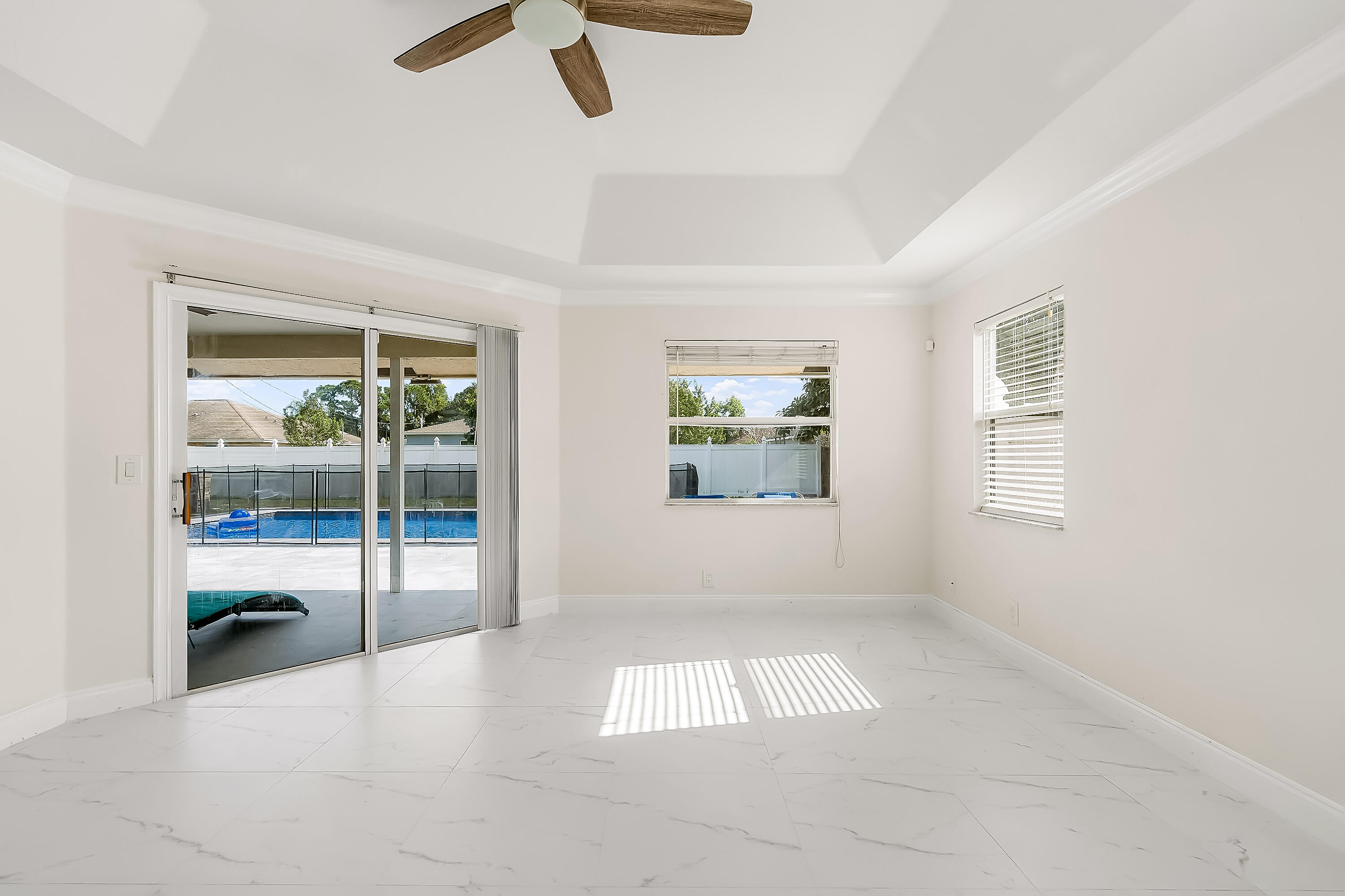 2962 Southwest Coastal Terrace Port St. Lucie, FL 34953 - Photo 44 of 59 a view of entryway and hall with a window