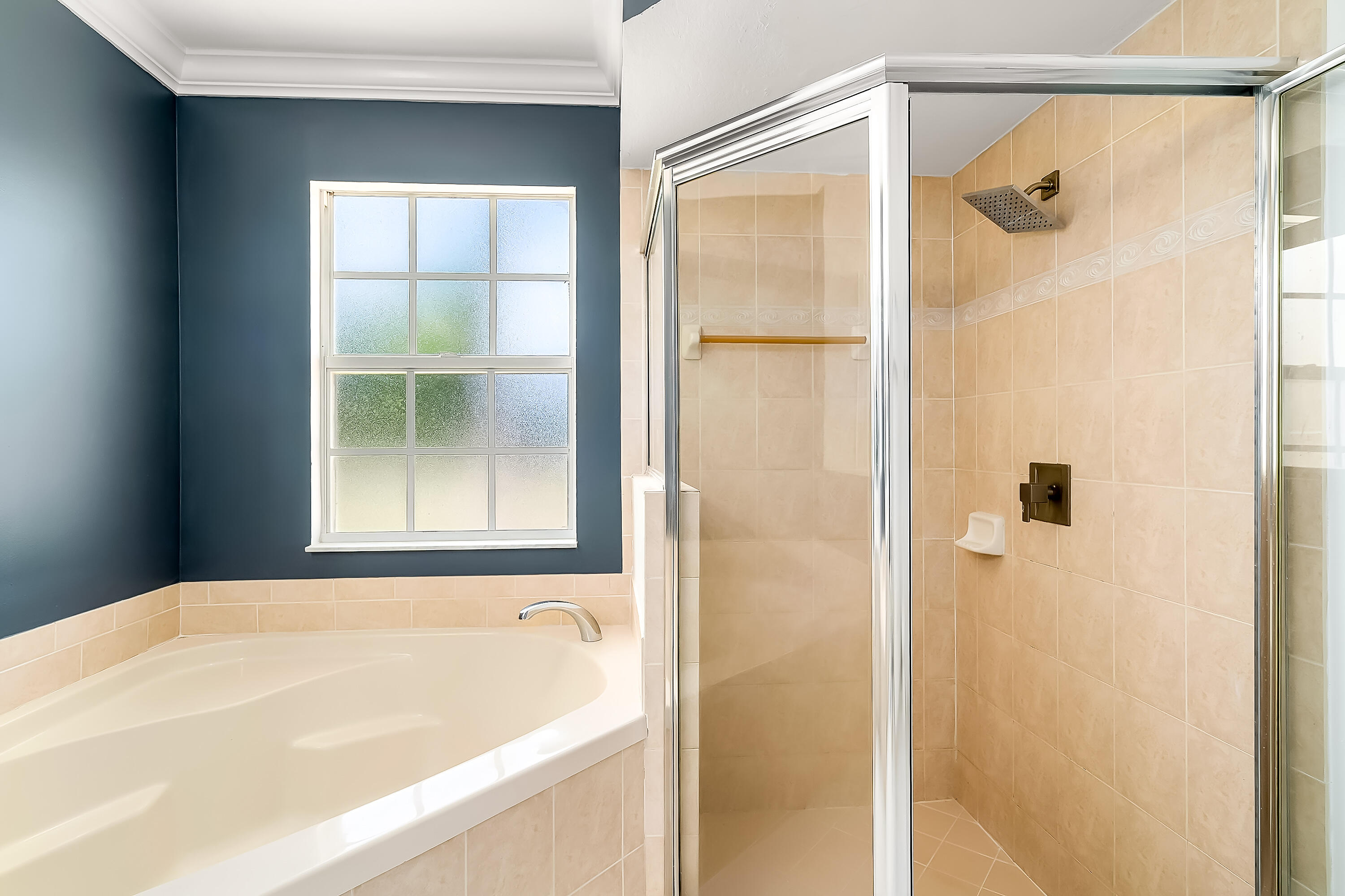 2962 Southwest Coastal Terrace Port St. Lucie, FL 34953 - Photo 49 of 59 a bathroom with a bathtub and shower