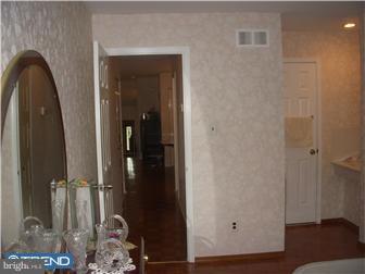 838 Hendrix Street Philadelphia, PA 19116 - Photo 7 of 12 a view of a bedroom with wooden floor