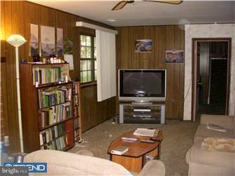 838 Hendrix Street Philadelphia, PA 19116 - Photo 9 of 12 a living room with furniture and a flat screen tv