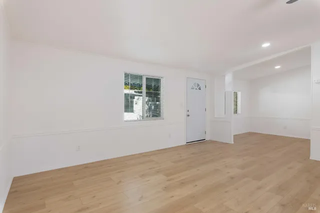 an empty room with windows