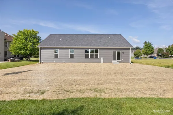 a house with yard in front of it