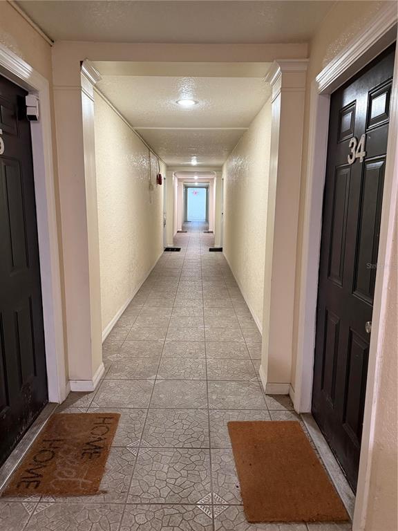 1928 South Conway Road, Unit 35 Orlando, FL 32812 - Photo 16 of 16 a view of hallway with a couch and a window
