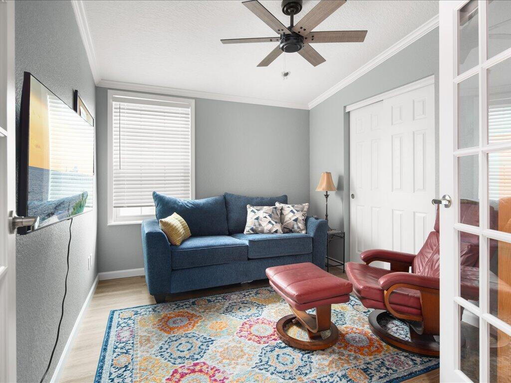 340 Pear Tree Avenue Goodland, FL 34140 - Photo 16 of 24 a living room with furniture and a window