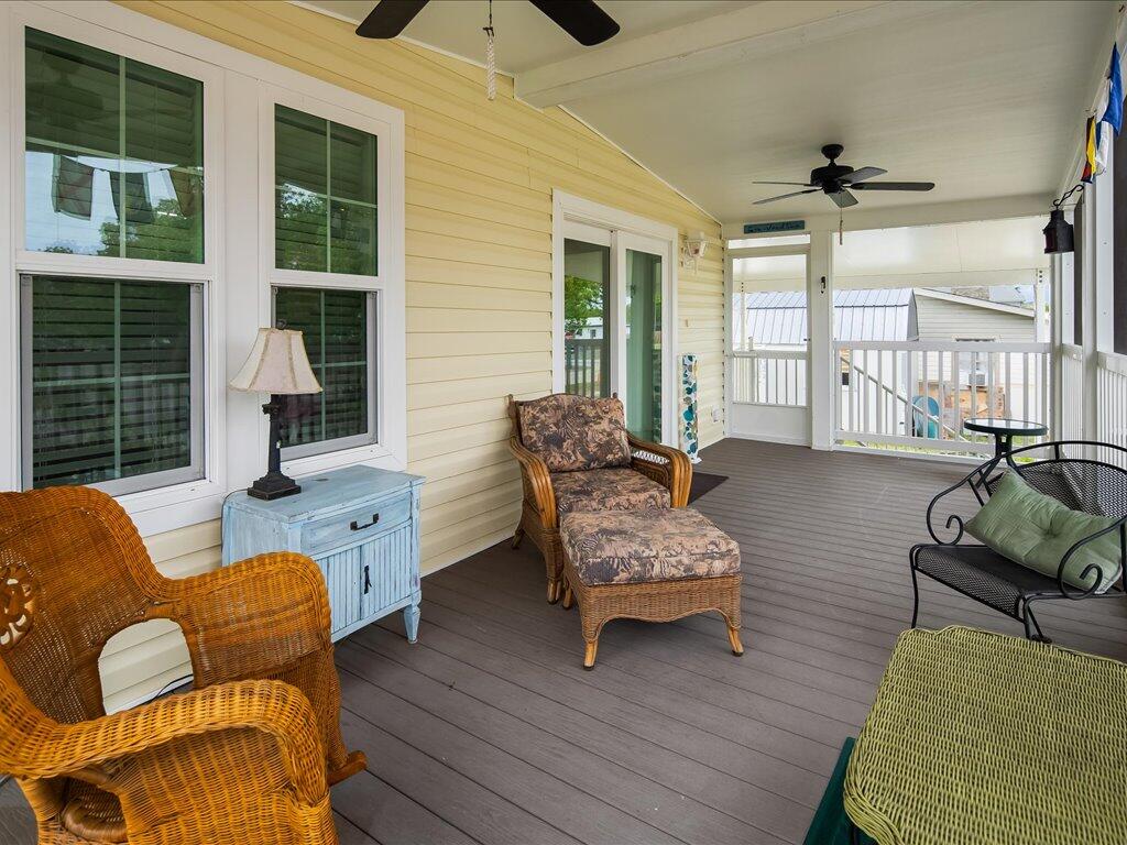 340 Pear Tree Avenue Goodland, FL 34140 - Photo 5 of 24 a living room with furniture and a large window