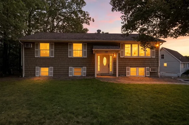 a house view with a garden space