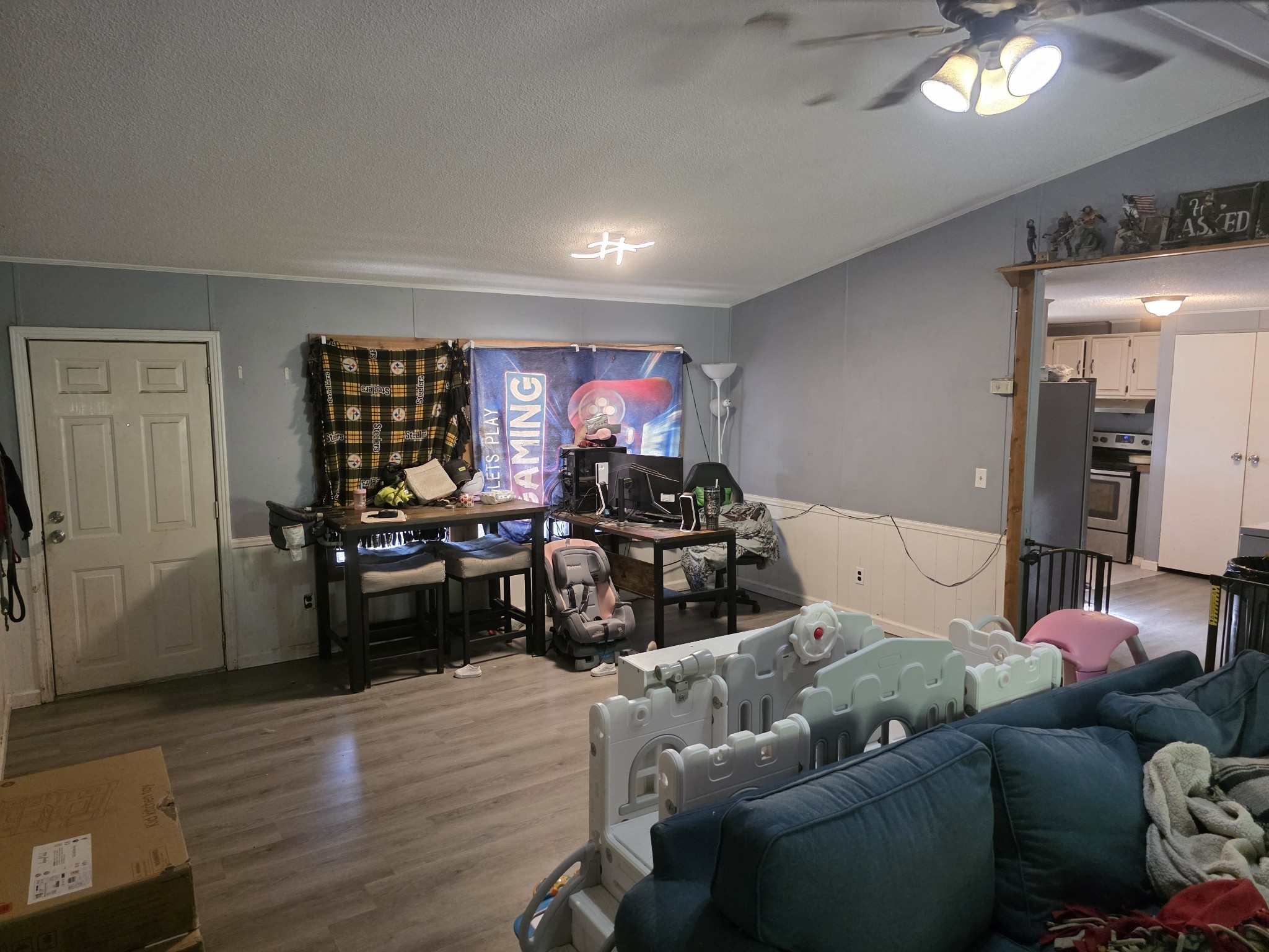 225 Opossum Hollow Road Watertown, TN 37184 - Photo 11 of 29 a living room with furniture and a wooden floor