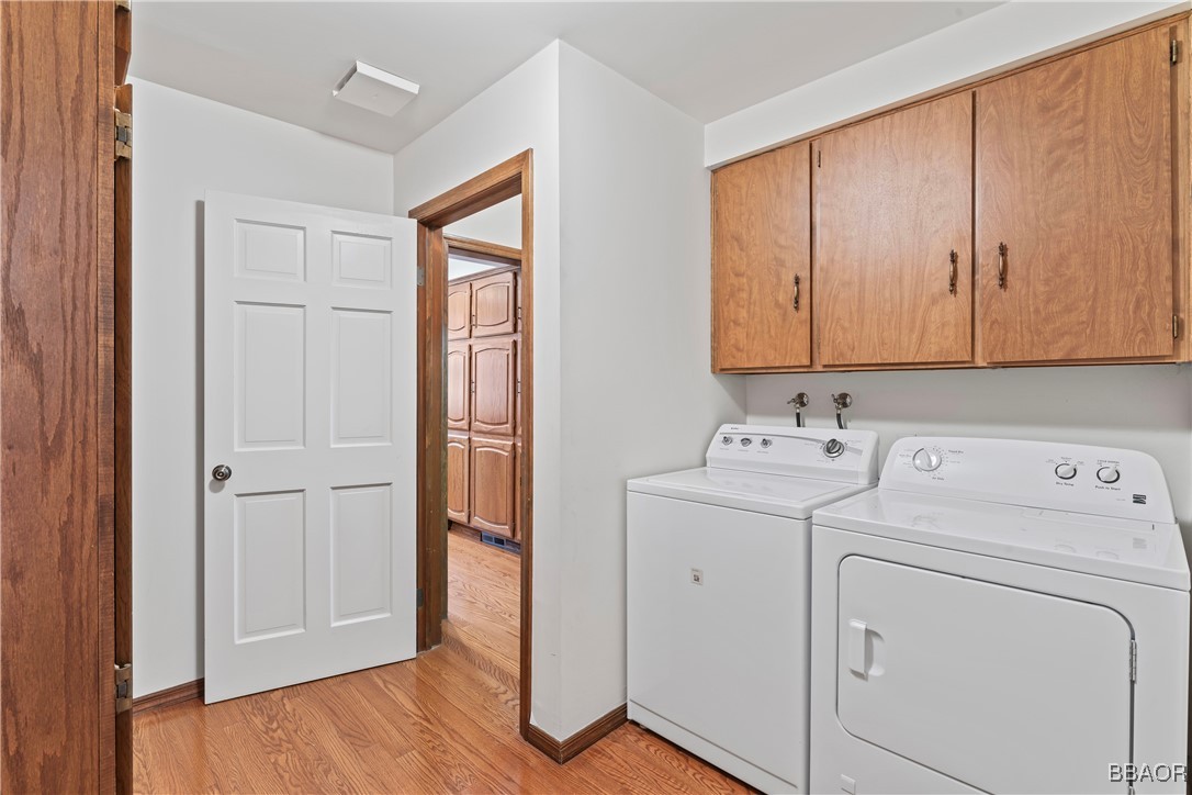 524 Golf Course Road Lake Arrowhead, CA 92352 - Photo 30 of 50 a view of storage and utility room with washer and dryer