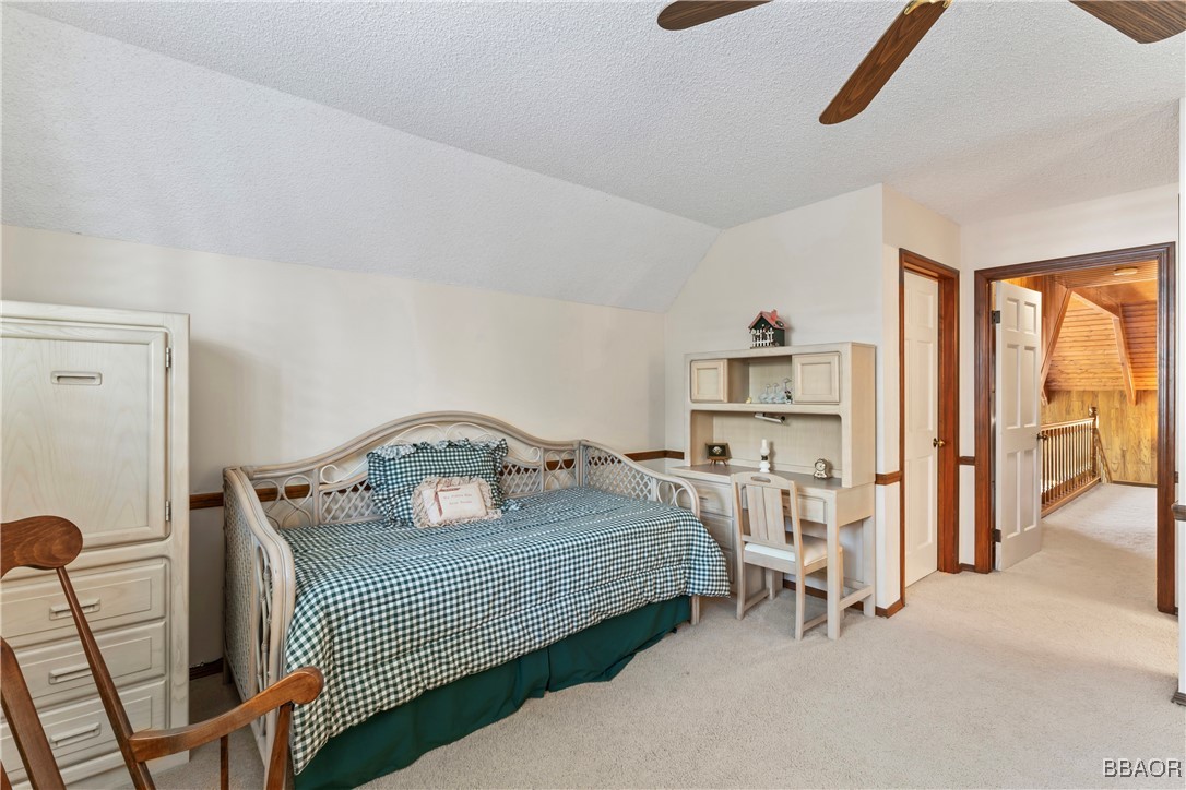 524 Golf Course Road Lake Arrowhead, CA 92352 - Photo 40 of 50 a bedroom with furniture and a window