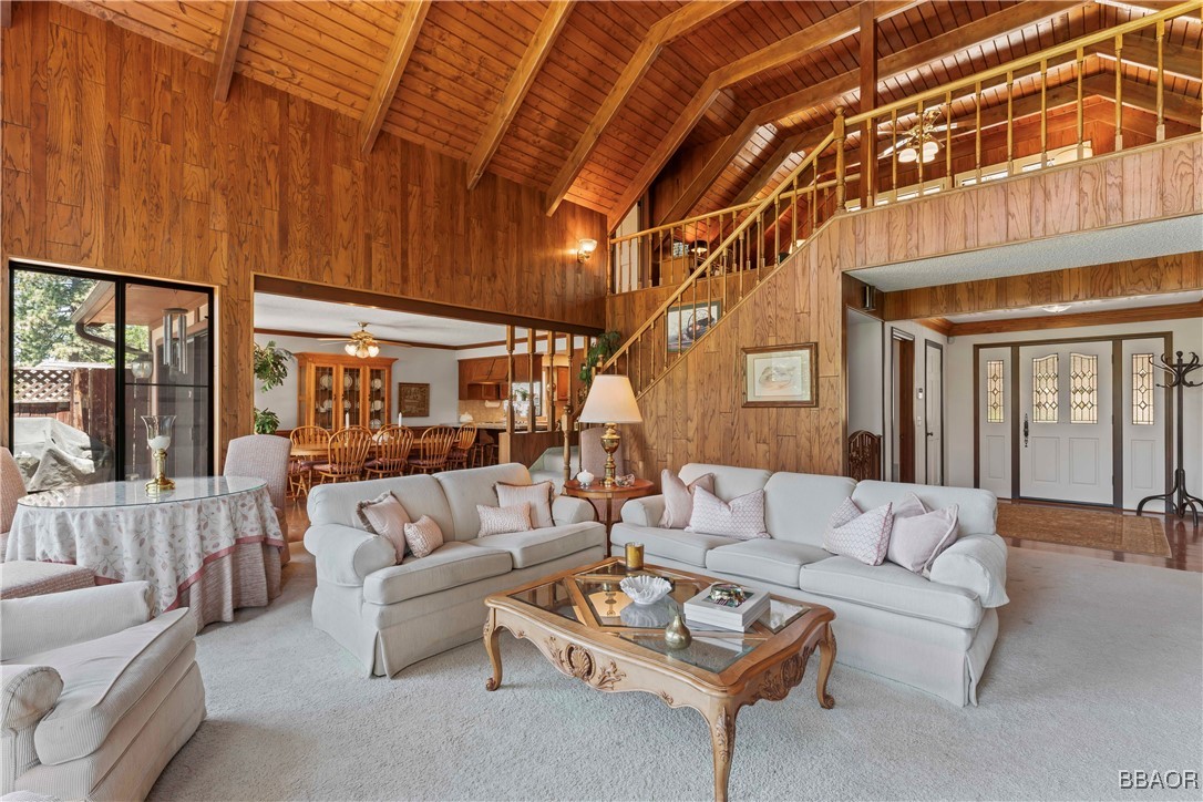524 Golf Course Road Lake Arrowhead, CA 92352 - Photo 10 of 50 a living room with furniture a ceiling fan and a window
