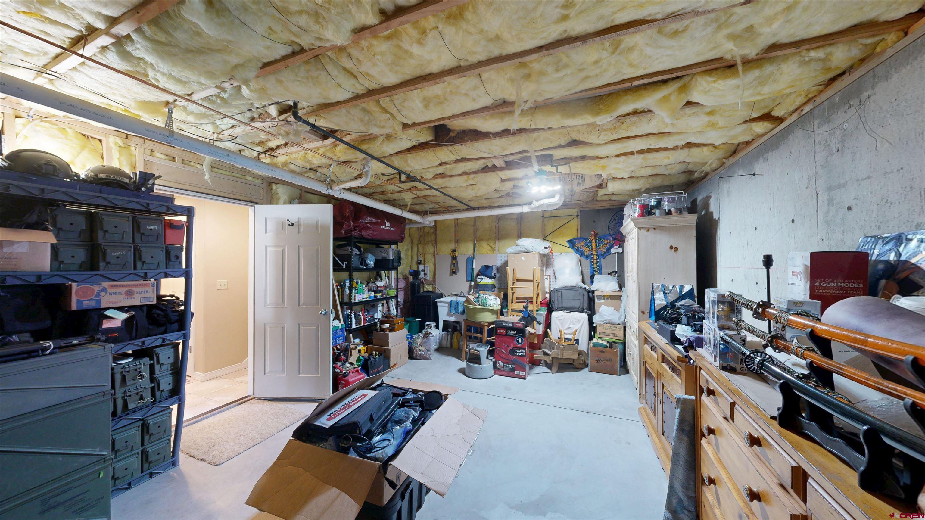 841 Woodbridge Way Durango, CO 81301 - Photo 19 of 27 a view of a storage room with furniture