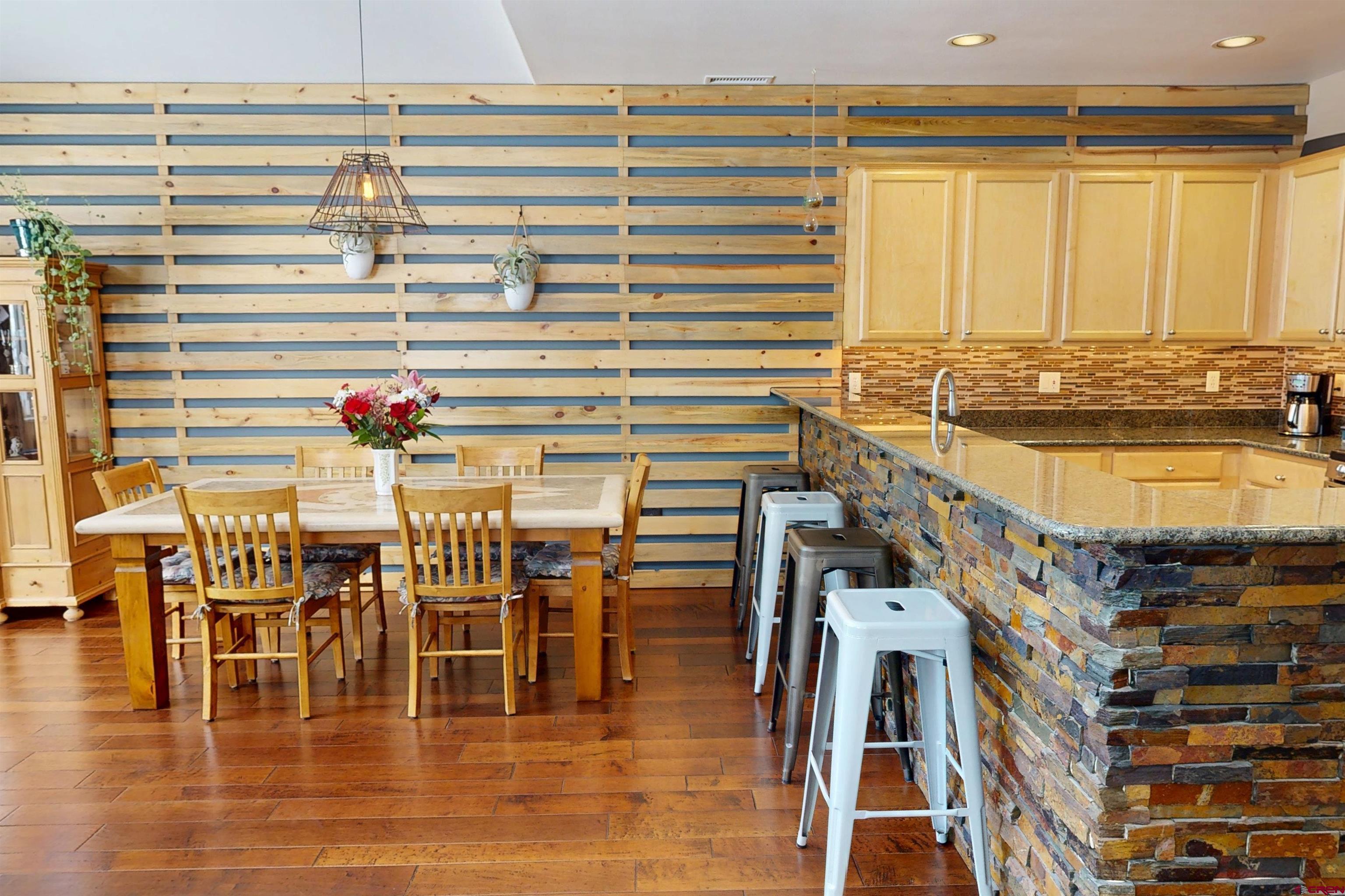 841 Woodbridge Way Durango, CO 81301 - Photo 6 of 27 a view of a swimming pool with outdoor seating