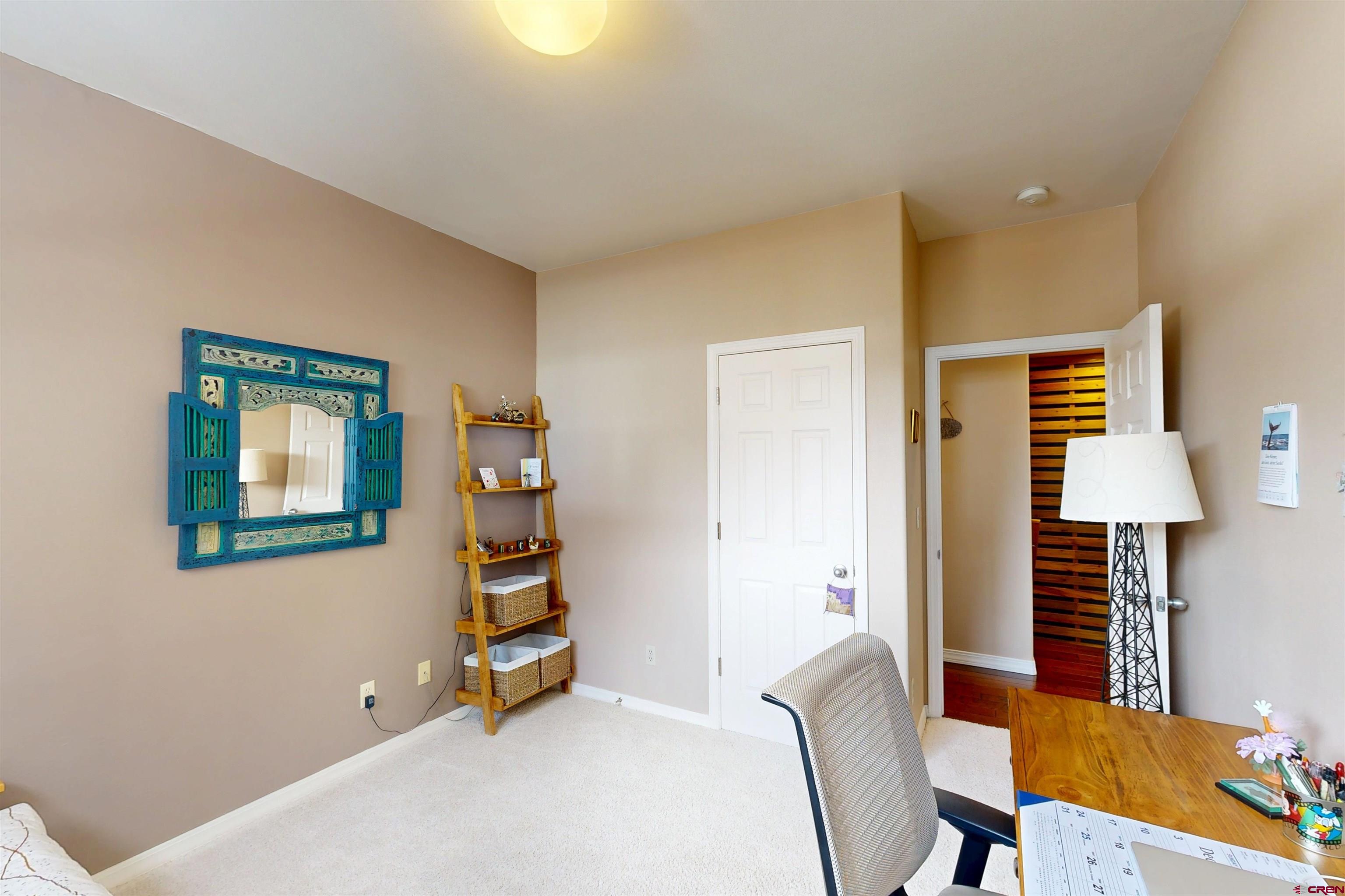 841 Woodbridge Way Durango, CO 81301 - Photo 9 of 27 a room with furniture and a window