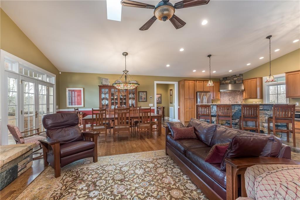 1723 Clark Road Rutherfordton, NC 28139 - Photo 12 of 37 a living room with furniture ceiling fan and a rug