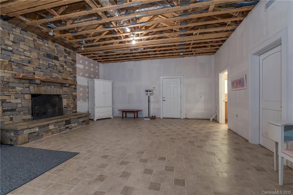 1723 Clark Road Rutherfordton, NC 28139 - Photo 24 of 37 a view of an empty room with a fireplace