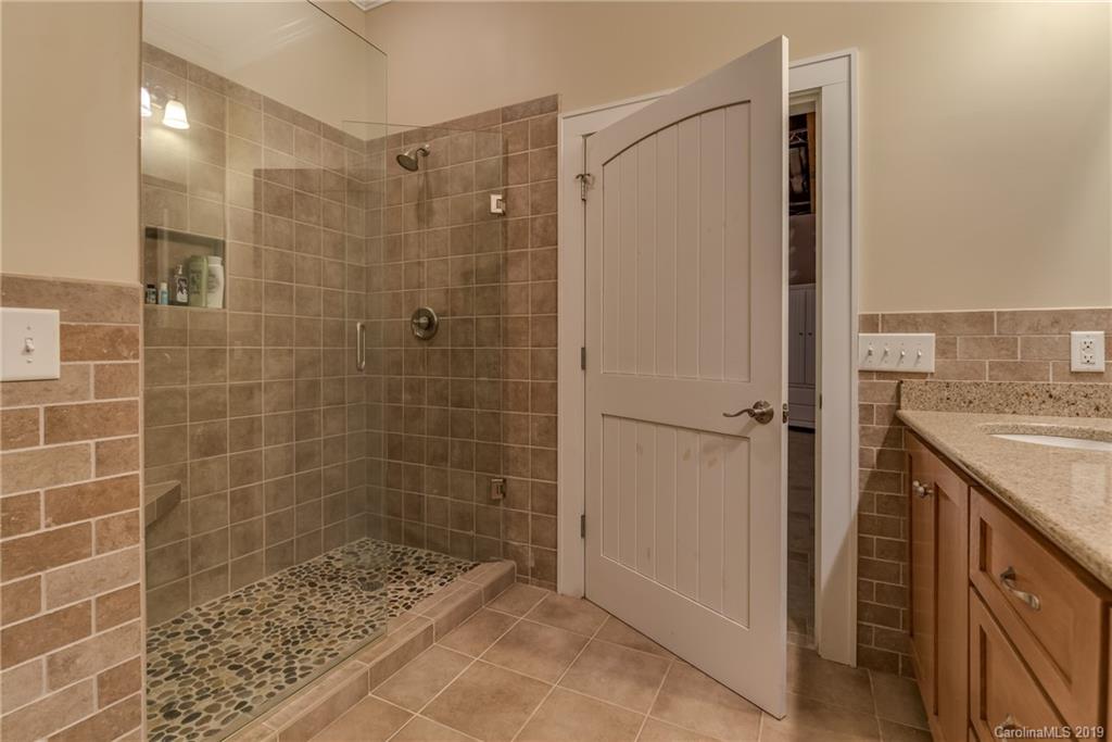 1723 Clark Road Rutherfordton, NC 28139 - Photo 25 of 37 a bathroom with a shower and a sink