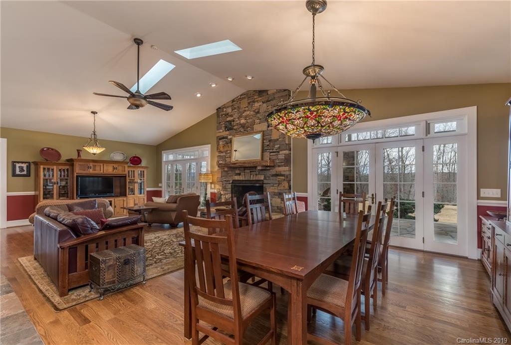 1723 Clark Road Rutherfordton, NC 28139 - Photo 7 of 37 a view of a dining room with furniture wooden floor and chandelier