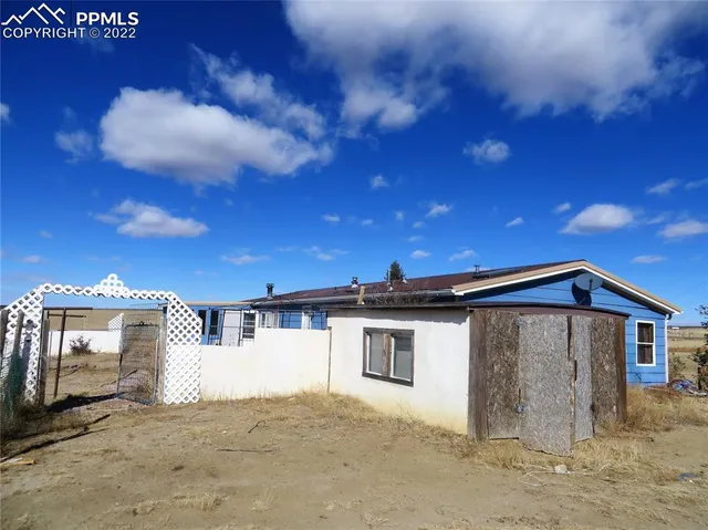 a view of a house with a patio