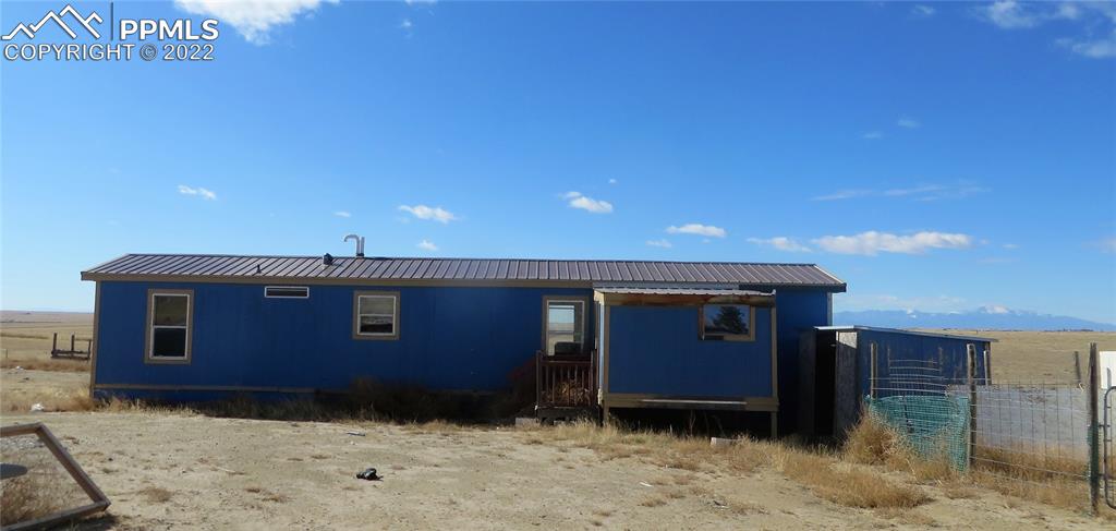 33895 Bellemont Road Yoder, CO 80864 - Photo 4 of 10 a front view of a house