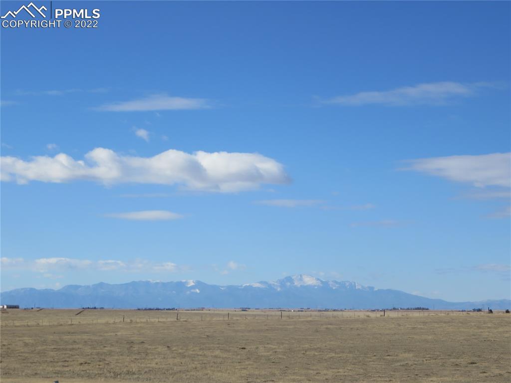 33895 Bellemont Road Yoder, CO 80864 - Photo 9 of 10 a view of ocean and sunset