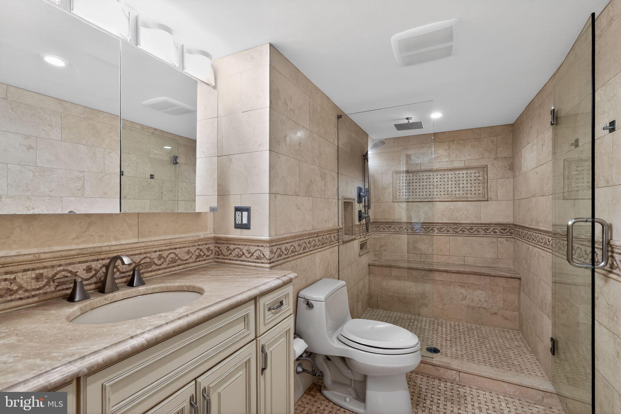 1420 Locust Street, Unit 31I Philadelphia, PA 19102 - Photo 10 of 25 a bathroom with a sink toilet and shower