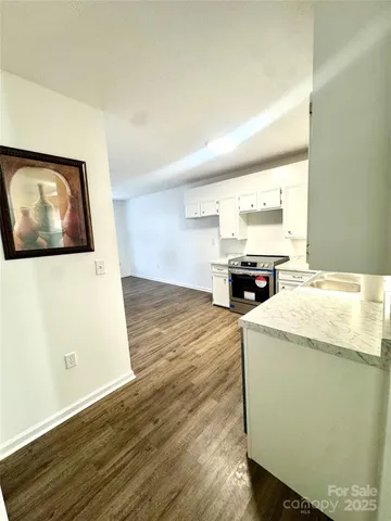 a living room with a wooden floor