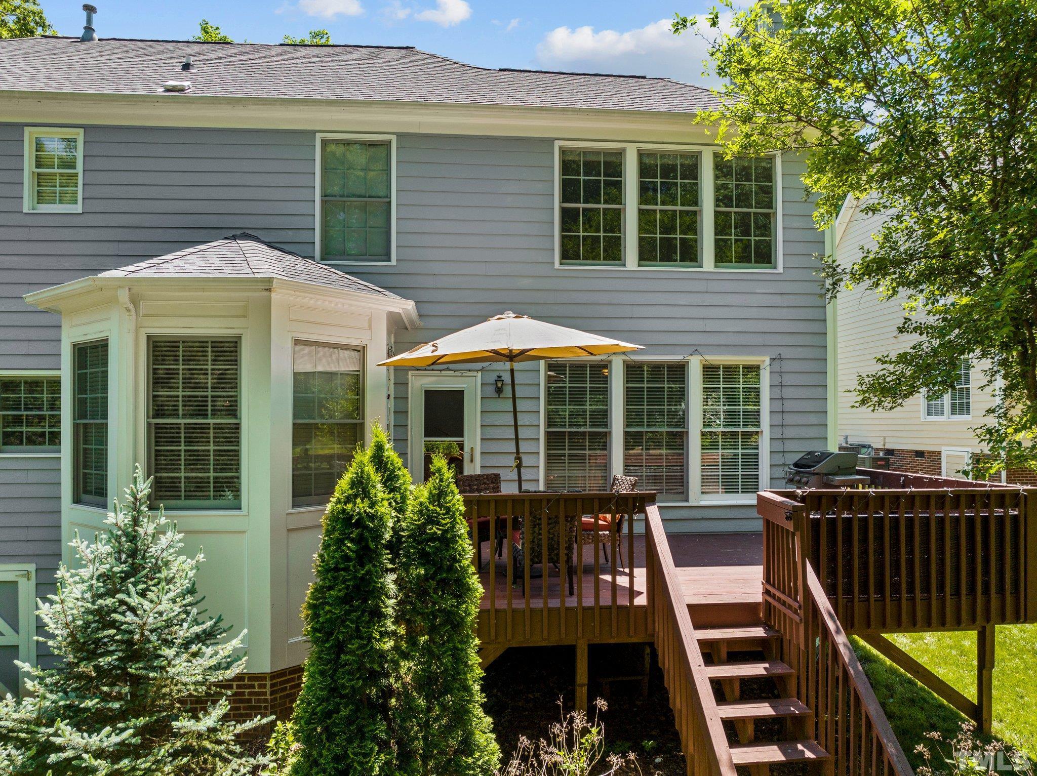 7900 Broad Street Raleigh, NC 27613 - Photo 37 of 53 a view of a house with backyard and porch