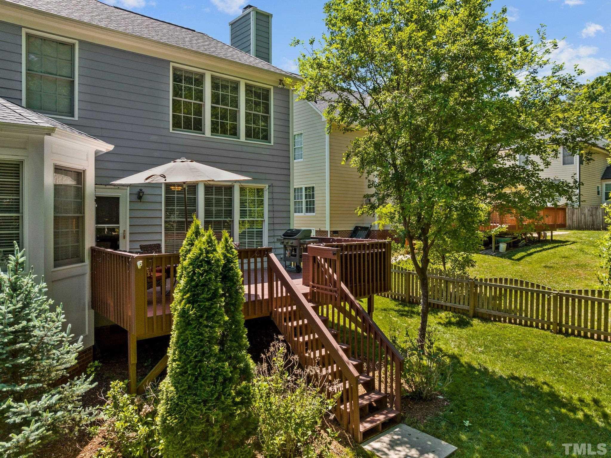 7900 Broad Street Raleigh, NC 27613 - Photo 38 of 53 a view of a house with backyard and sitting area