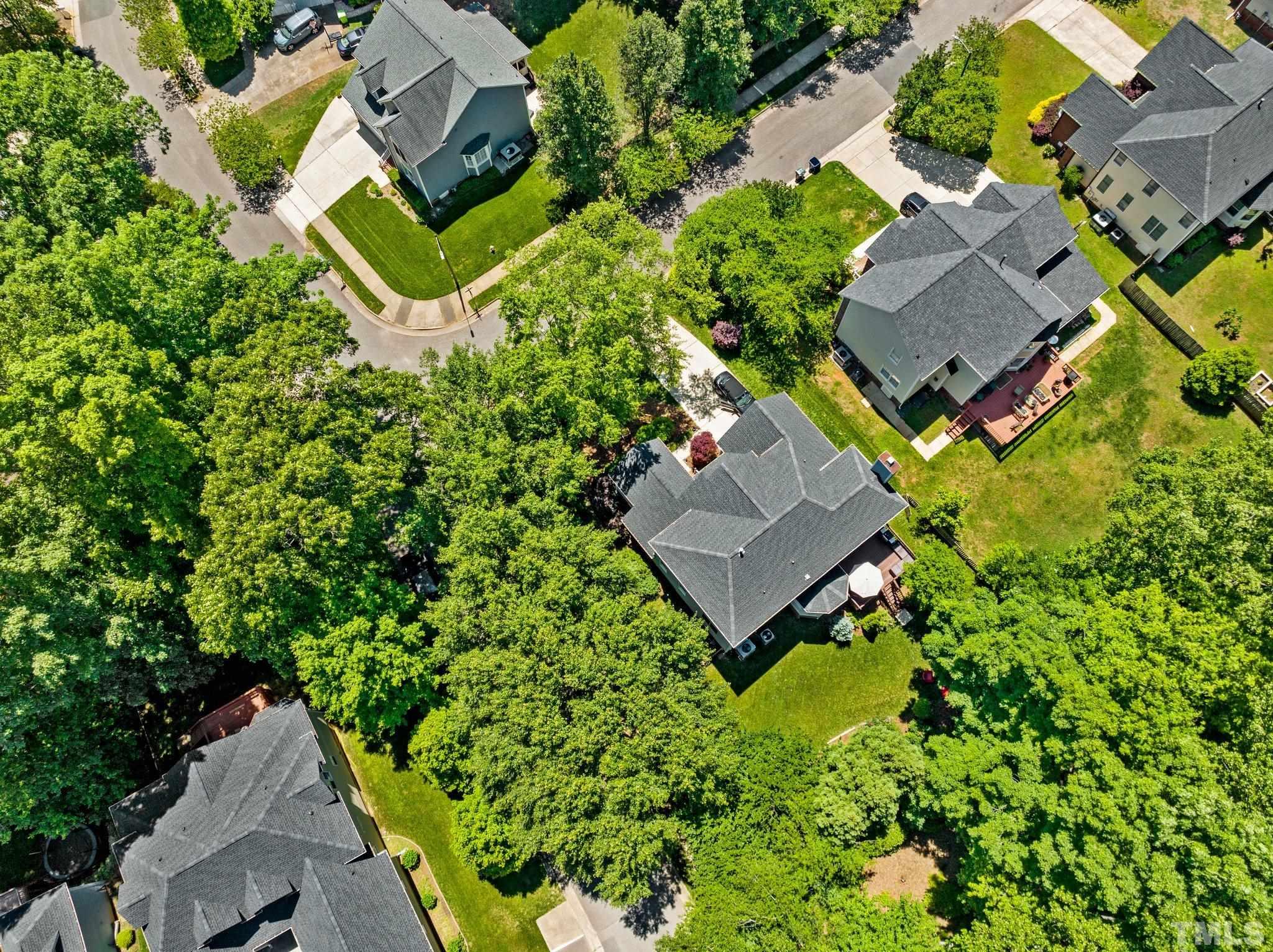 7900 Broad Street Raleigh, NC 27613 - Photo 47 of 53 an aerial view of a house with garden space and street view