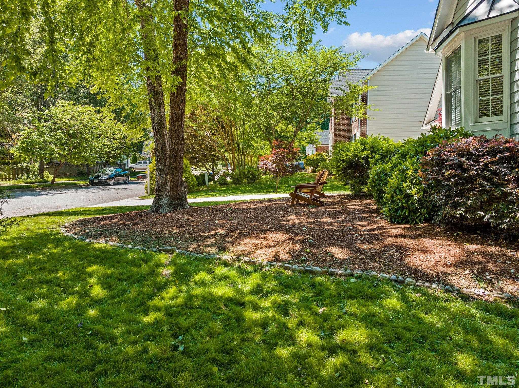 7900 Broad Street Raleigh, NC 27613 - Photo 52 of 53 a view of a tree in front of a house