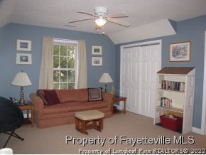 165 Cliff Road Southern Pines, NC 28387 - Photo 8 of 11 a living room with furniture and a window