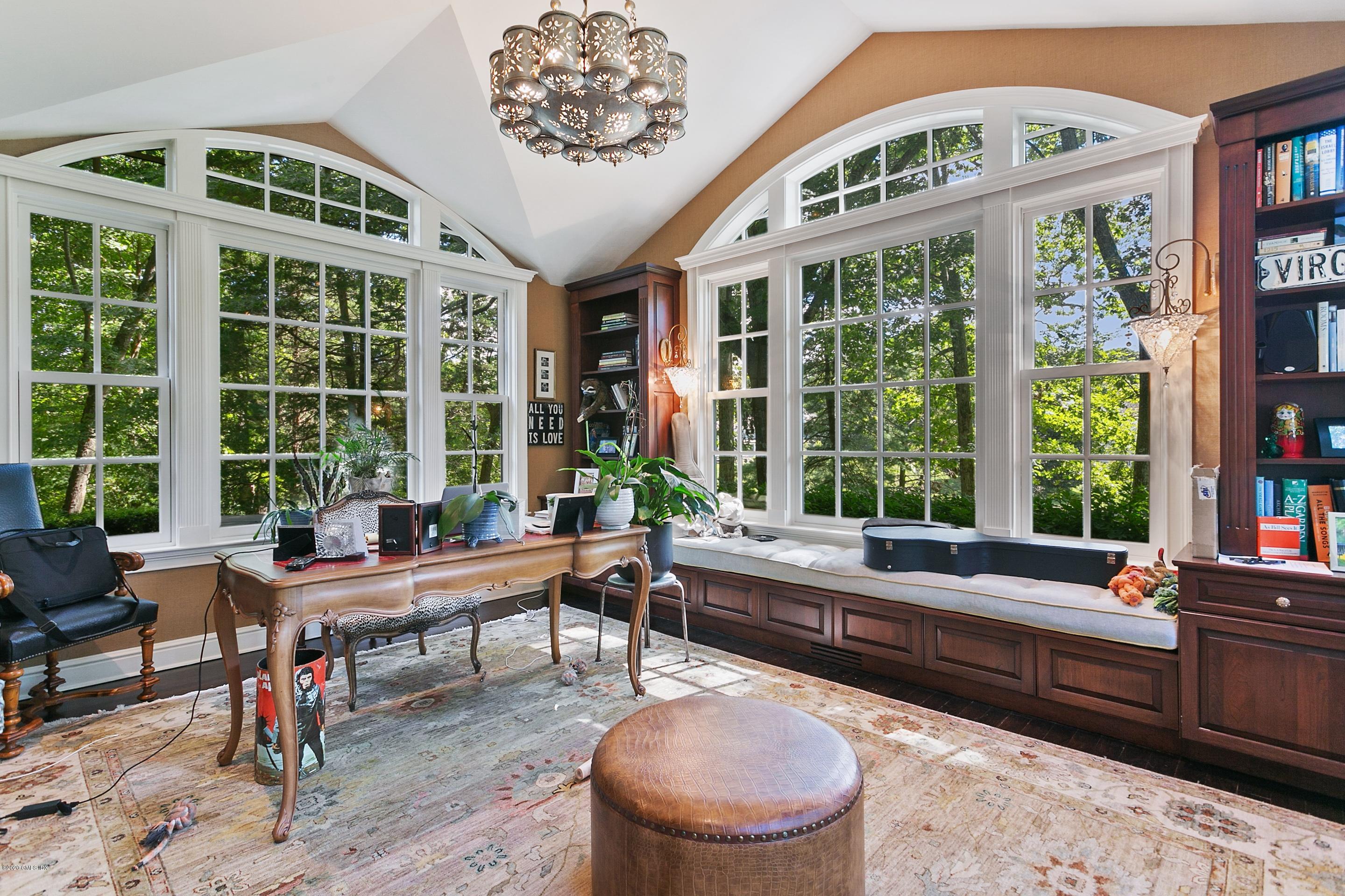 9 Rippowam Road New Canaan, CT 06840 - Photo 14 of 35 a room with furniture and a large window