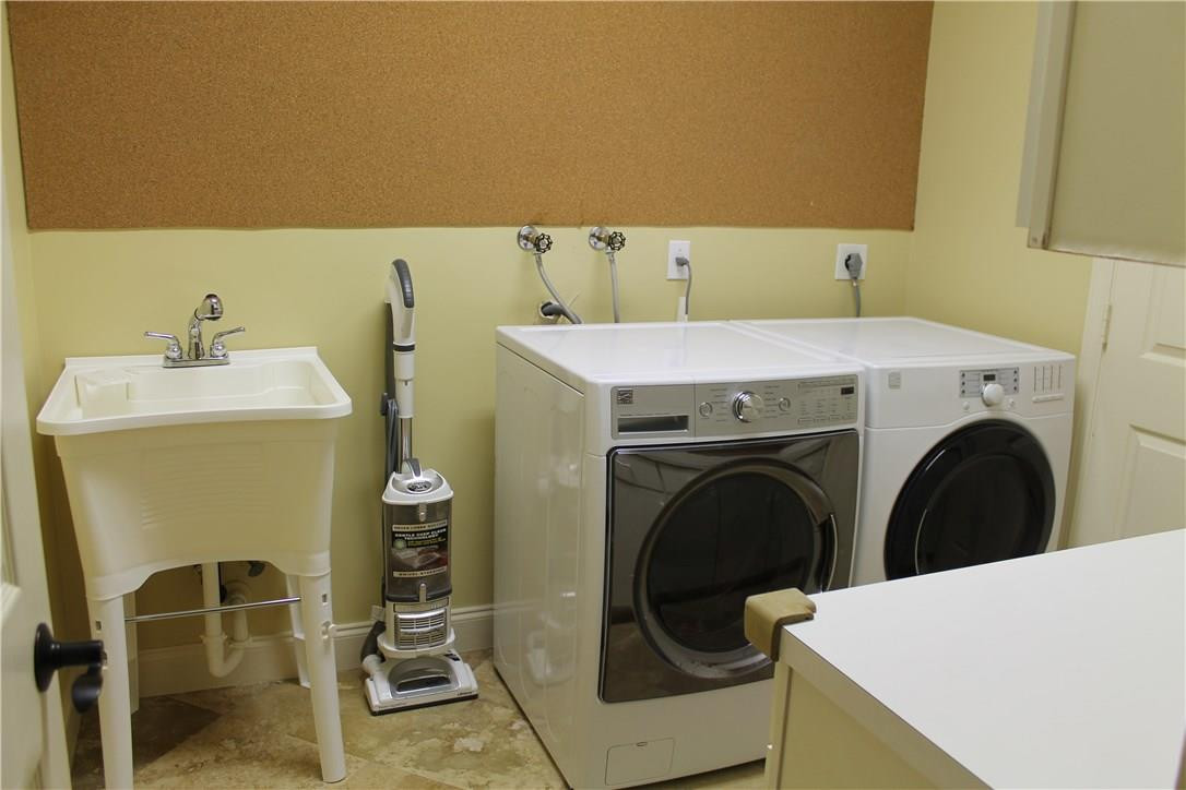 21491 Halstead Drive Boca Raton, FL 33428 - Photo 34 of 35 a utility room with dryer and washer