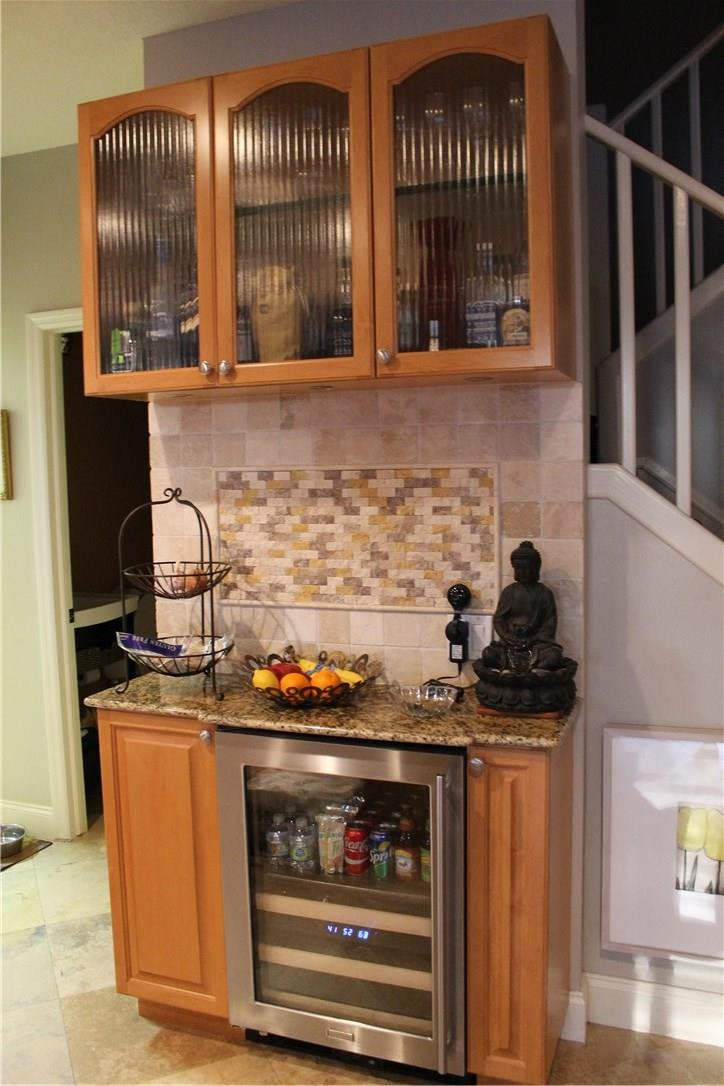 21491 Halstead Drive Boca Raton, FL 33428 - Photo 6 of 35 a kitchen with stainless steel appliances granite countertop a stove and a microwave