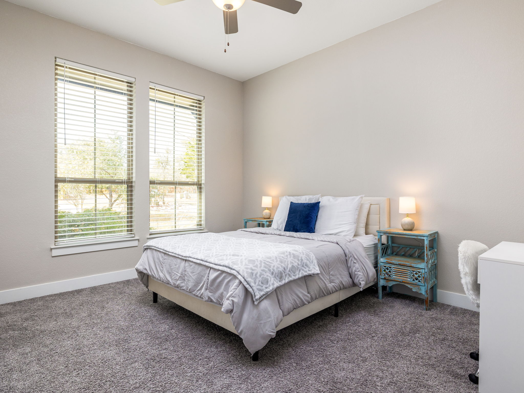 901 Clark Cove Road Buda, TX 78610 - Photo 14 of 37 Bedroom with carpet and ceiling fan