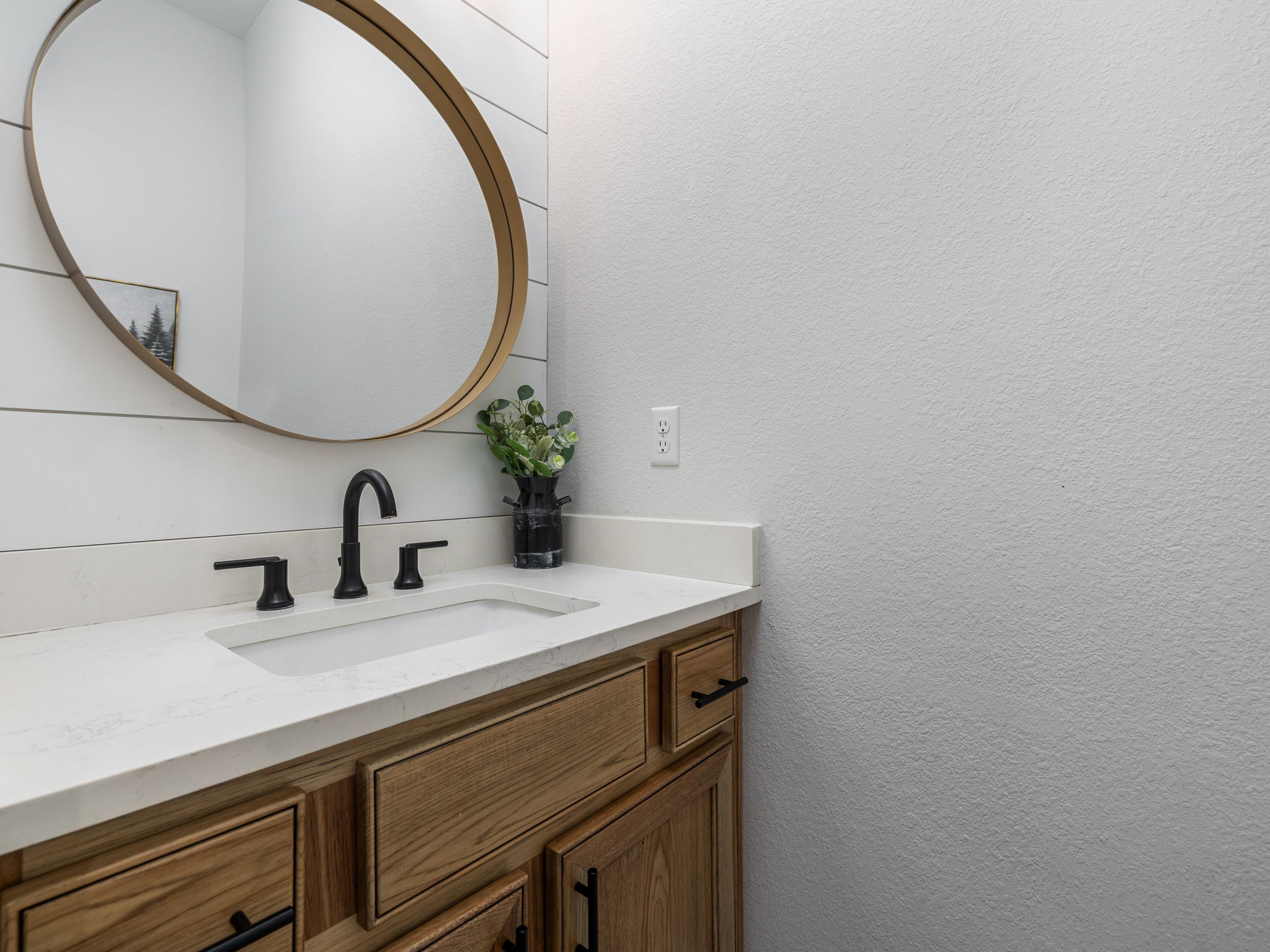 901 Clark Cove Road Buda, TX 78610 - Photo 10 of 37 Bathroom featuring vanity and a textured wall