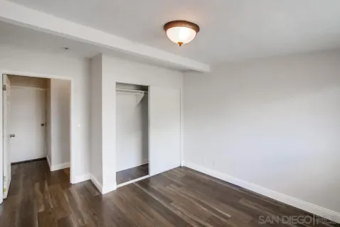 a view of a livingroom with wooden floor