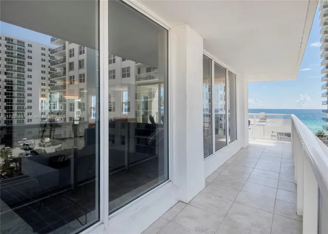 a bathroom with a tub and shower