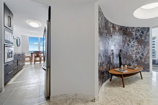 a living room with a couch and a stove