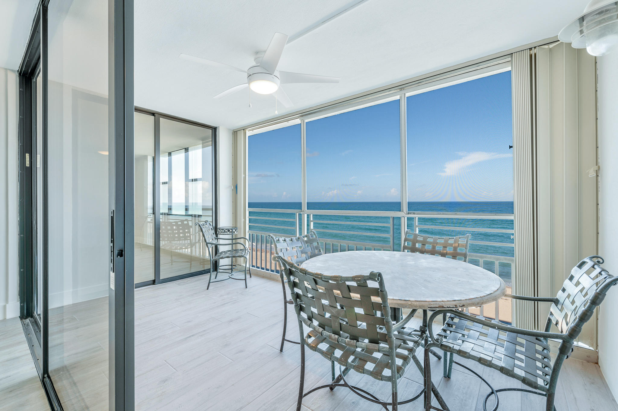 900 Ocean Drive, Unit 403 Juno Beach, FL 33408 - Photo 2 of 15 a dining room with furniture and window