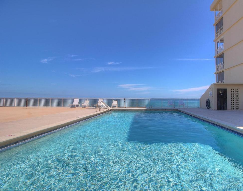 900 Ocean Drive, Unit 403 Juno Beach, FL 33408 - Photo 14 of 15 a view of a yard with an empty space