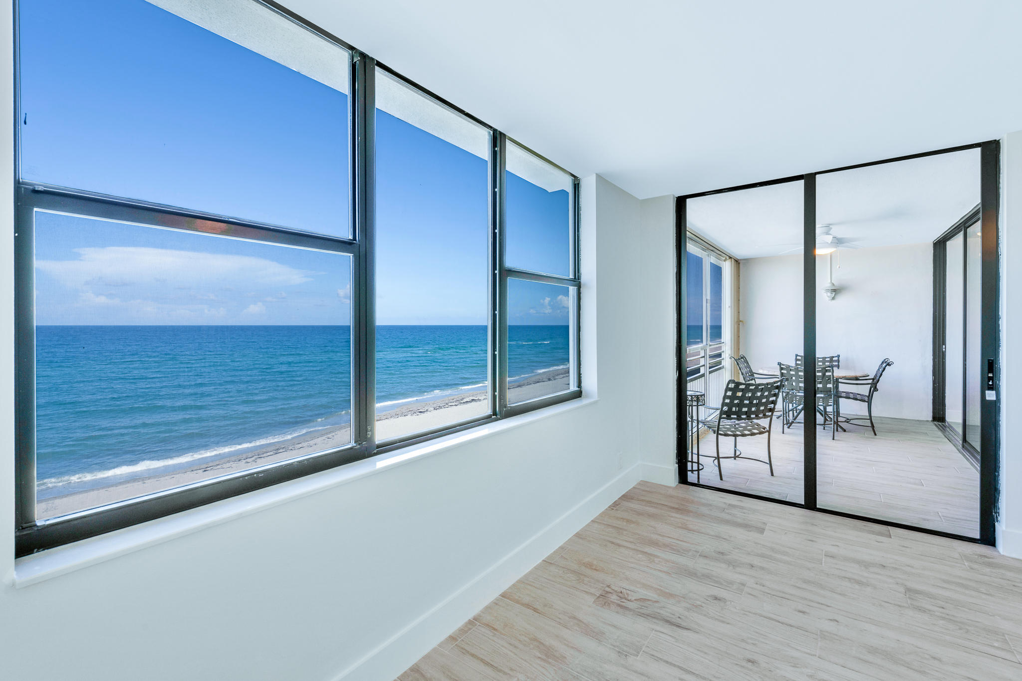 900 Ocean Drive, Unit 403 Juno Beach, FL 33408 - Photo 8 of 15 a view of an empty room with window