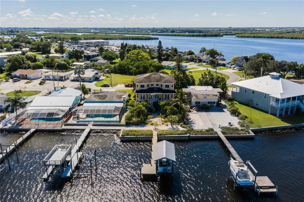 an aerial view of a house with a ocean view
