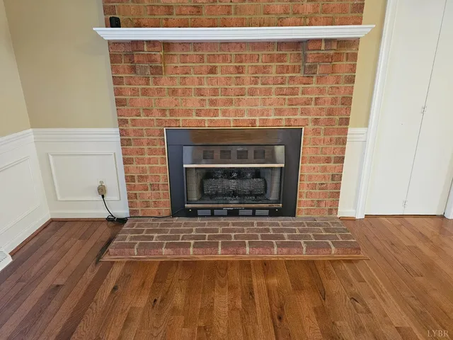 a kitchen with granite countertop a sink cabinets and a window