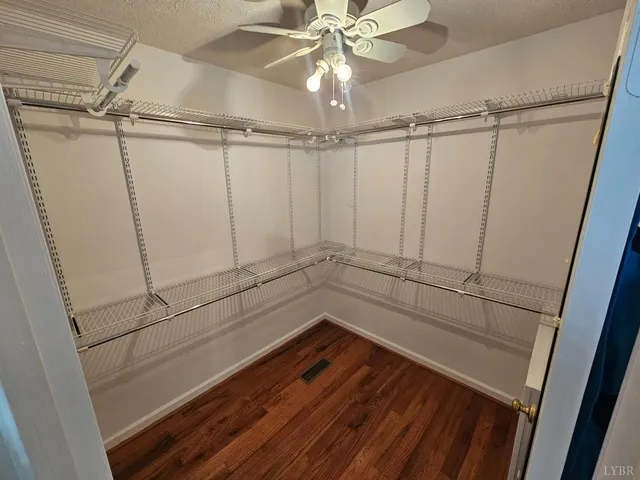a bathroom with a sink a vanity and a mirror