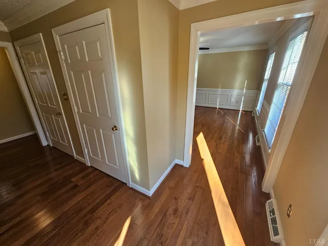 a view of a livingroom with wooden floor